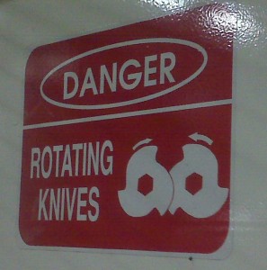 rotating knives sign